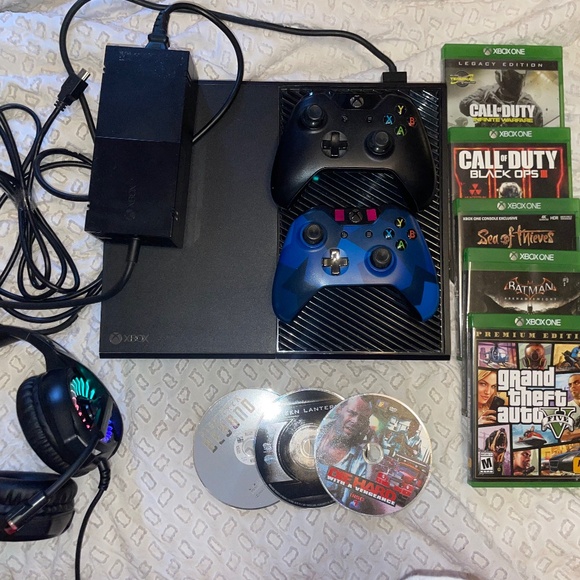 Xbox one with games, headset, and 2 controllers